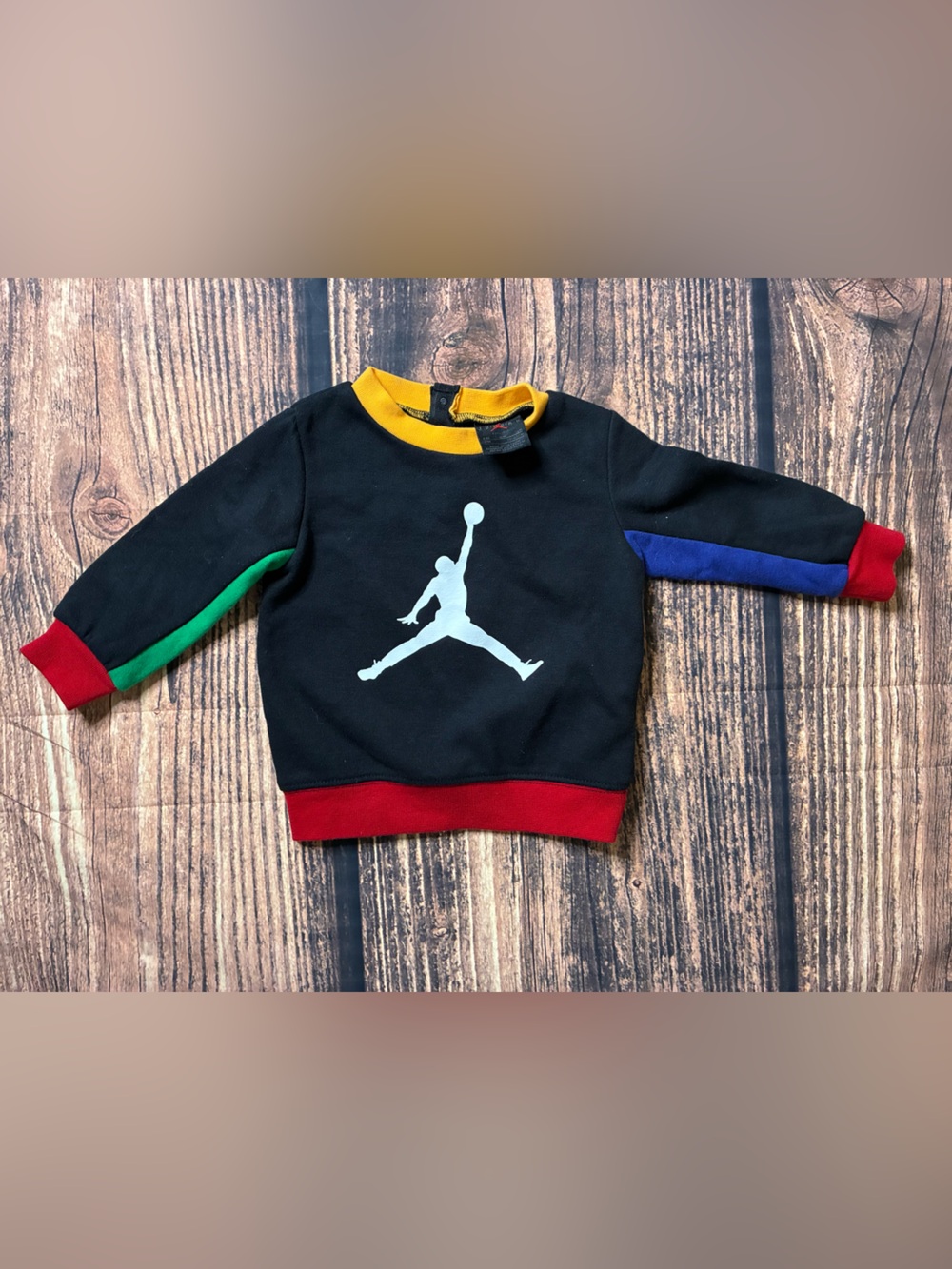 Jordan Black Sweatshirt with Red, Yellow, Blue and Green Accents size 12M